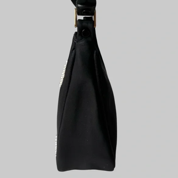 Kate Spade Embellished durable woven nylon with leather trim
Matte lining - Picture 9 of 12